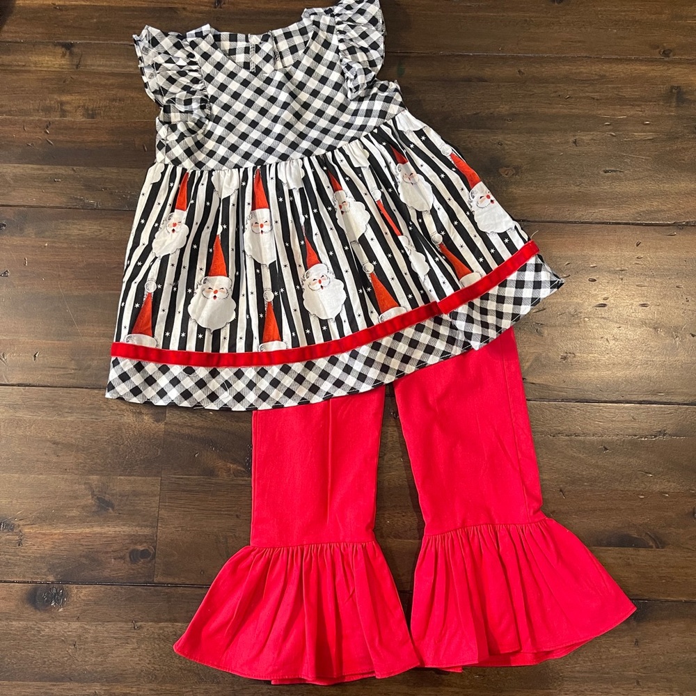 Ric Rac and Ruffles Santa set, black and white top and red flair pants size 2T